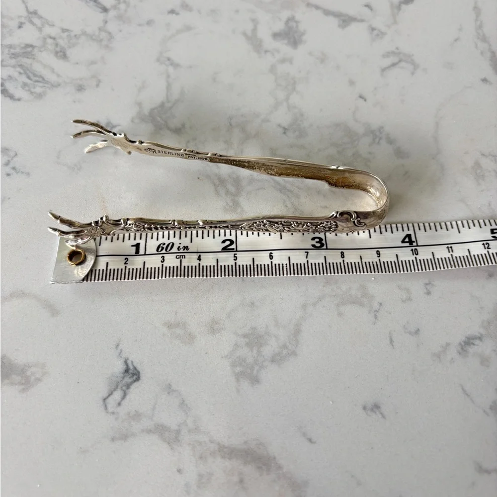 Antique sterling sugar tongs made by Whiting Manufacturing Co